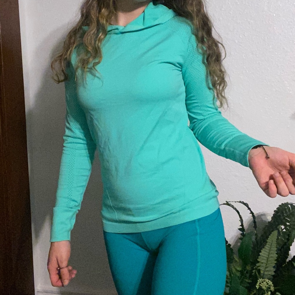 Athletic teal running jacket